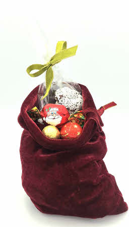 Velvet zakje met gevulde kransjes en andere kerstchocolade